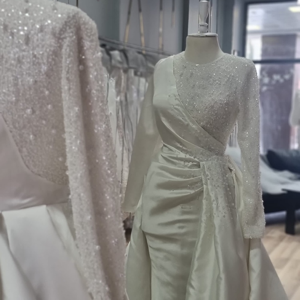 Long Sleeve beaded wedding dress. Hijabi friendly. Satin beaded wedding dress.